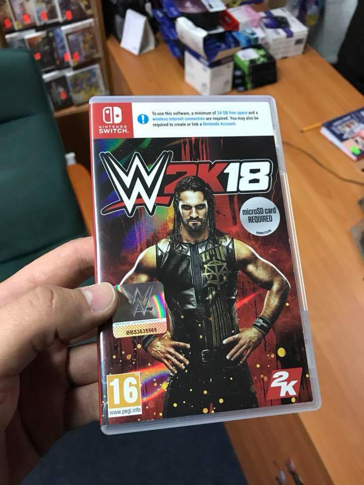 nintendo-switch-wwe2k18-in-hand