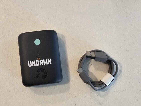 Undawn Battery Charger | The Outerhaven Photo of the included Battery Charger and Cord for Undawn Survival Kit