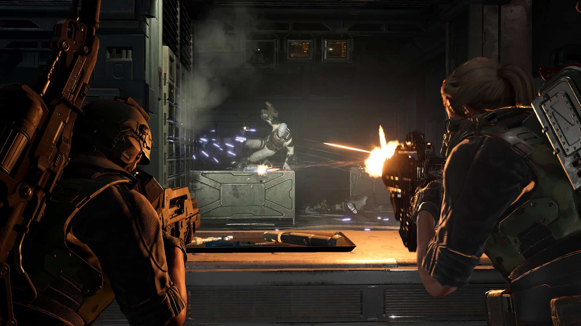 ss_d94d91fc046687b02ec98e03176b6b881706bf1f1920x1080 | The Outerhaven Three soldiers in futuristic armor fire inside a dark sci‑fi corridor as an enemy leaps between crates and sparks fly.