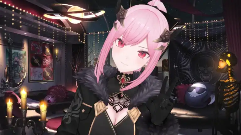 Mori Calliope | The Outerhaven Pink-haired anime girl in a black fur-trimmed outfit making a peace sign, standing in a festive, candlelit lounge with string lights and playful Halloween decor in the background.