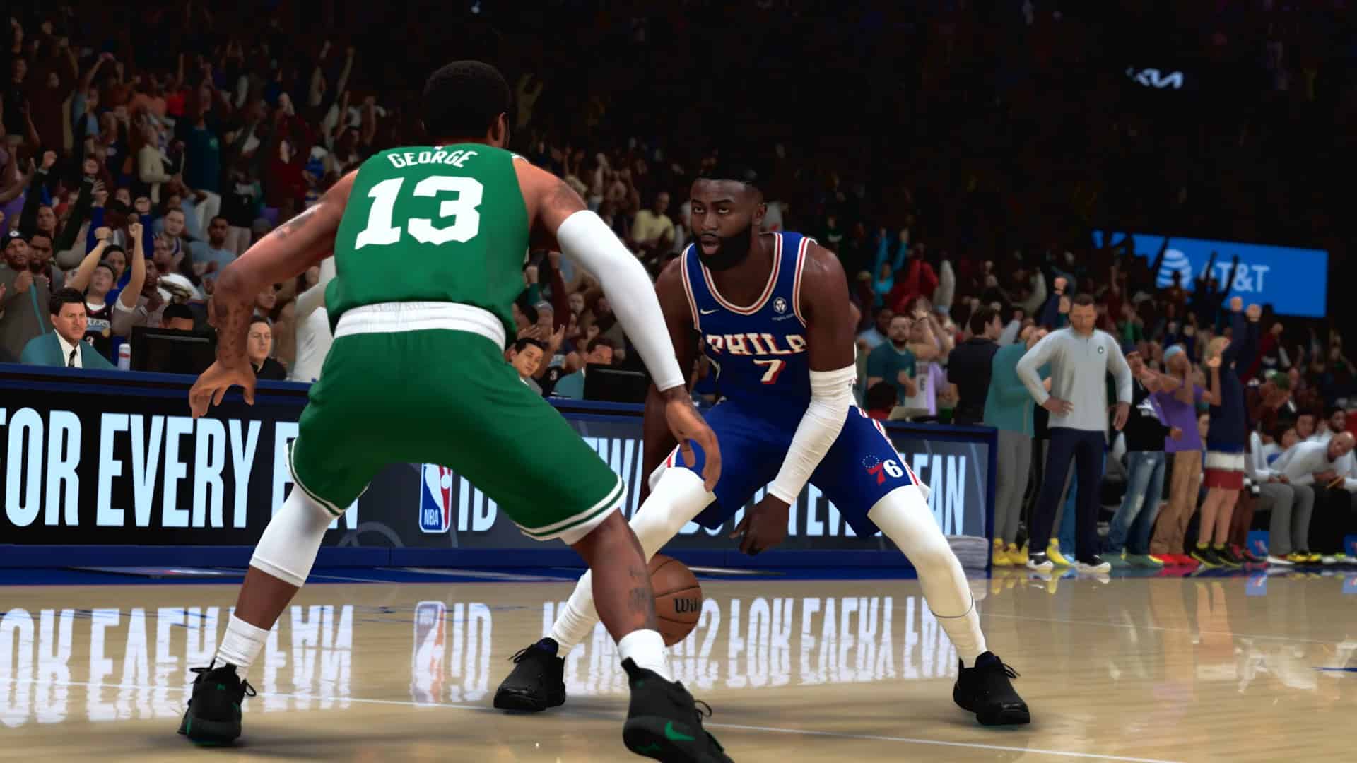 NBA 2K27_ Official Gameplay Trailer 1-10 screenshot Basketball players contesting the ball on a crowded court; green jersey #13 faces blue jersey #7 as fans cheer in the background.