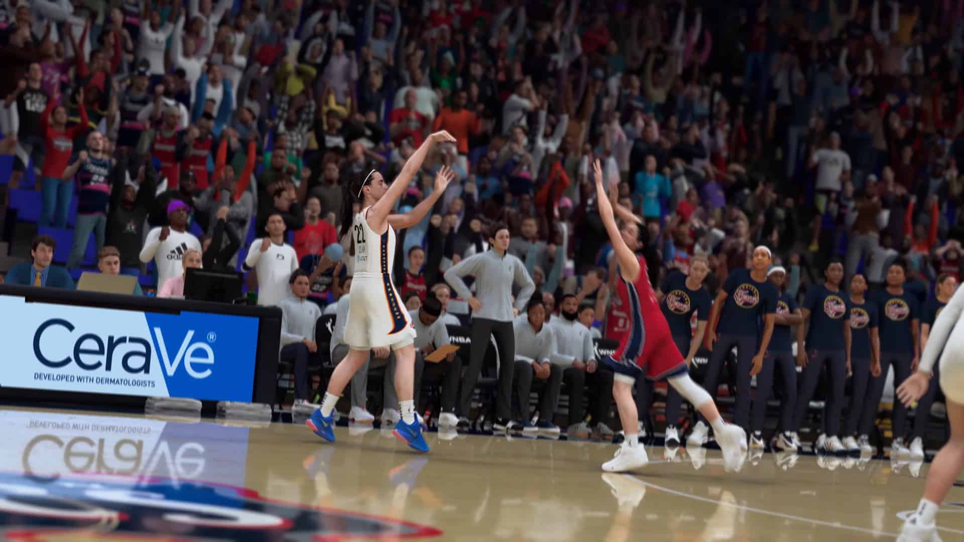 NBA 2K27_ Official Gameplay Trailer 1-40 screenshot Basketball game in a crowded arena with two players mid-shot near the sideline and fans cheering in the stands.
