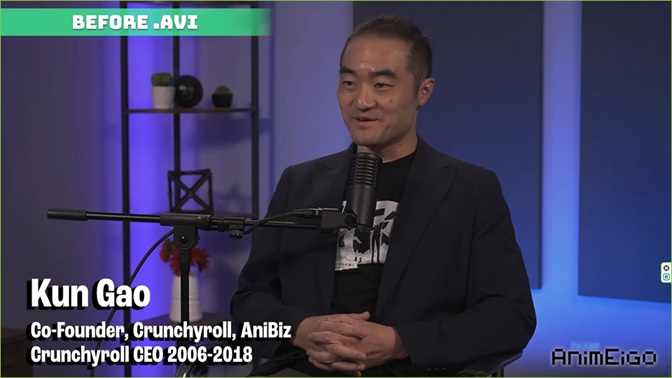 Kun Gao | The Outerhaven Man sits in a studio interview setting with a large microphone in front; lower-third text shows Kun Gao, Crunchyroll co-founder and former CEO (2006–2018).