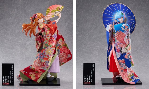 Evangelion | The Outerhaven Two anime-style figurines in ornate floral kimonos on display: the left figure has orange hair and a fan, the right figure has blue hair and a blue parasol.