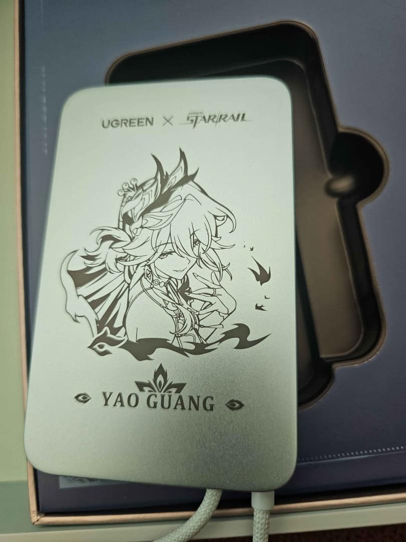 honkai front charger | The Outerhaven A front picture of the battery charger in the Honkai: Star Rail X UGREEN Gift Set