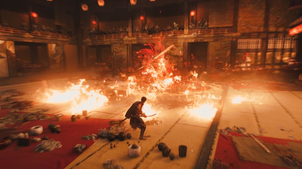 Onimusha_WS_SS_10_-_Shuten_Doji Ninja warrior in dark armor battles a large fire-breathing dragon in a burning traditional dojo with tatami mats and flames everywhere.