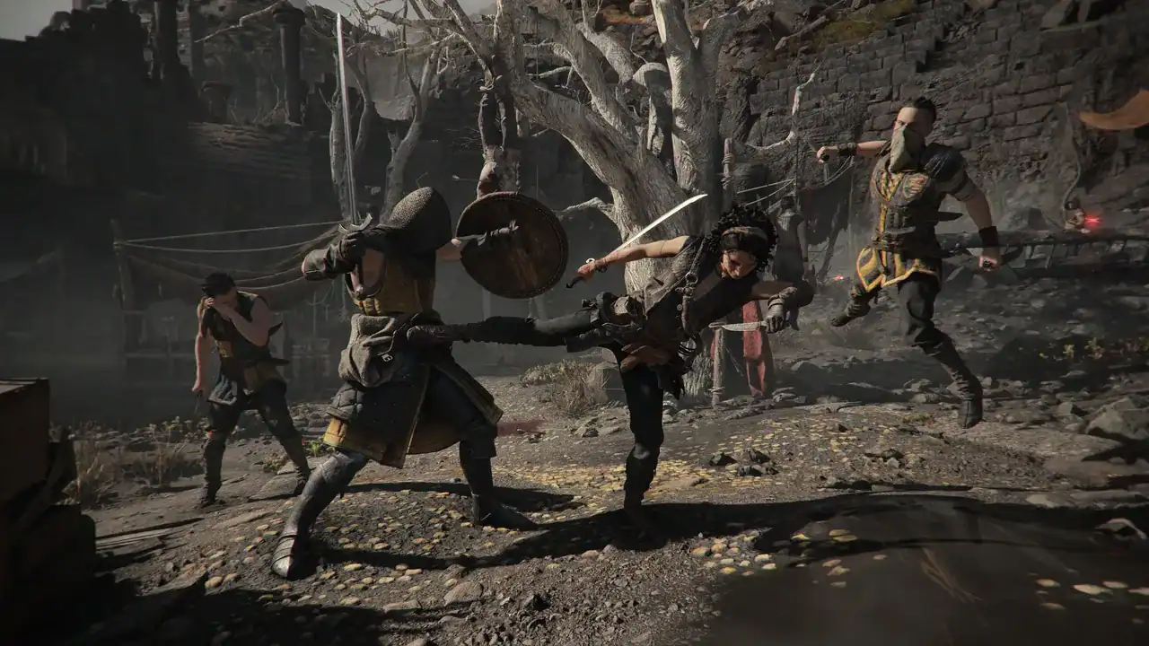 Resonance-A-Plague-Tale-Legacy-screenshot01 | The Outerhaven Group of armored fighters clash in a ruined courtyard, one kicking a foe while others strike with swords and shields.