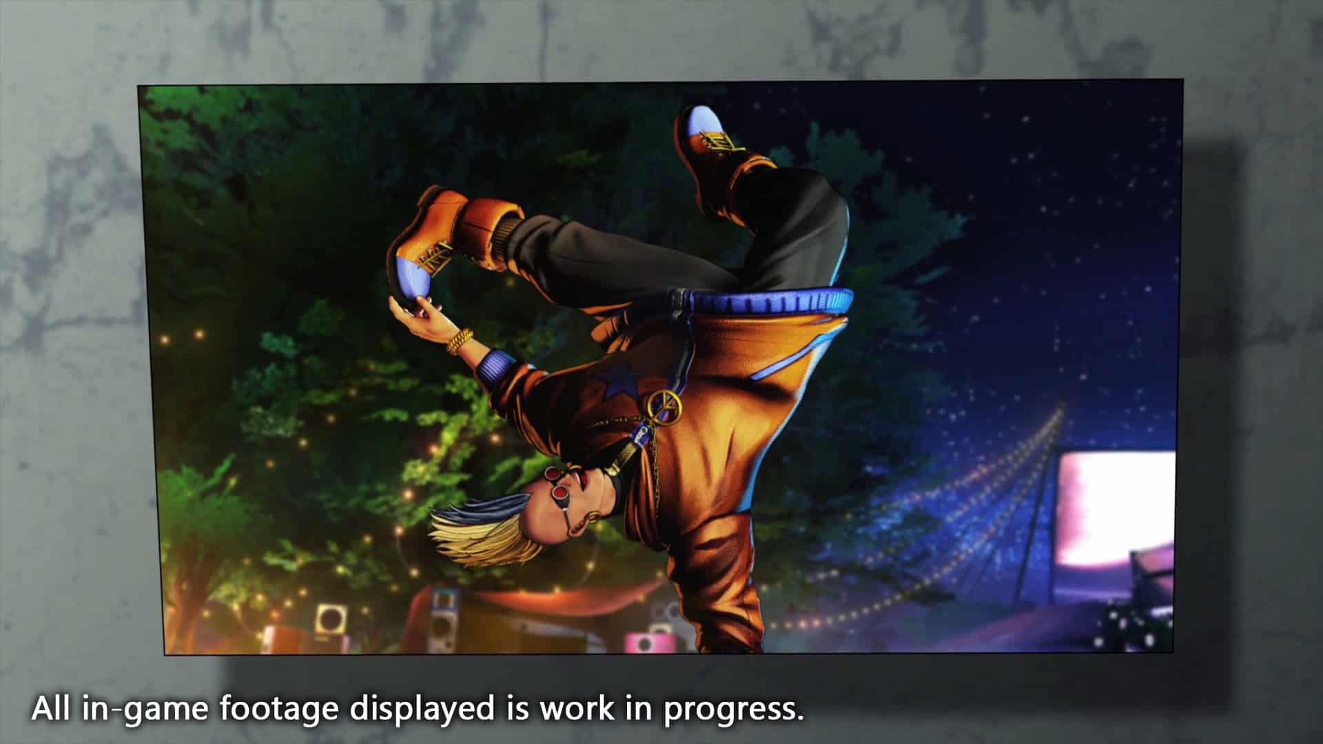 SS_開発中キャプション_duck9 | The Outerhaven Close-up of a screen showing a person in an orange outfit and blue sneakers doing a handstand mid-air in a forest setting, with a caption at the bottom reading 'All in-game footage displayed is work in progress.'