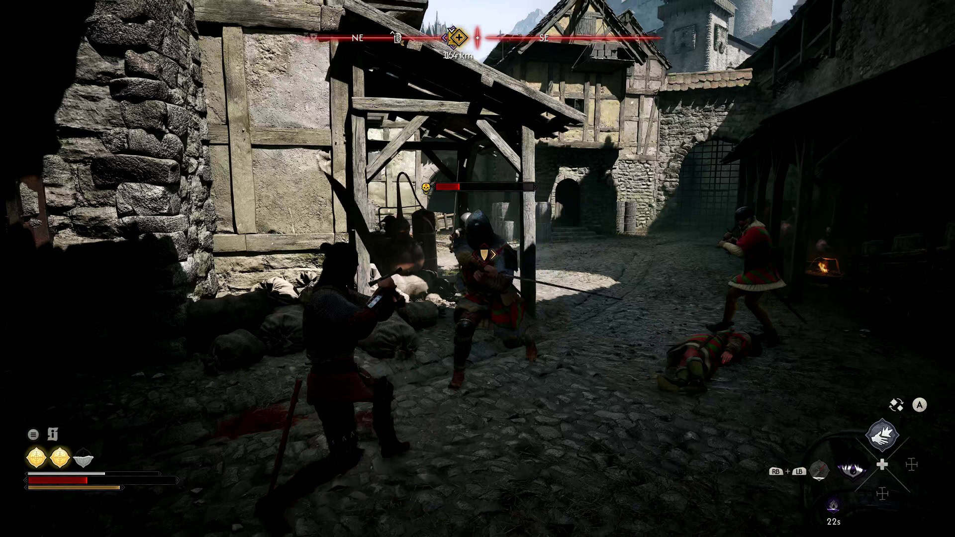 The Blood of Dawnwalker Combat | The Outerhaven Two armored warriors fight in a narrow medieval street as a fallen enemy lies nearby, with stone buildings and a wooden scaffold surrounding them.