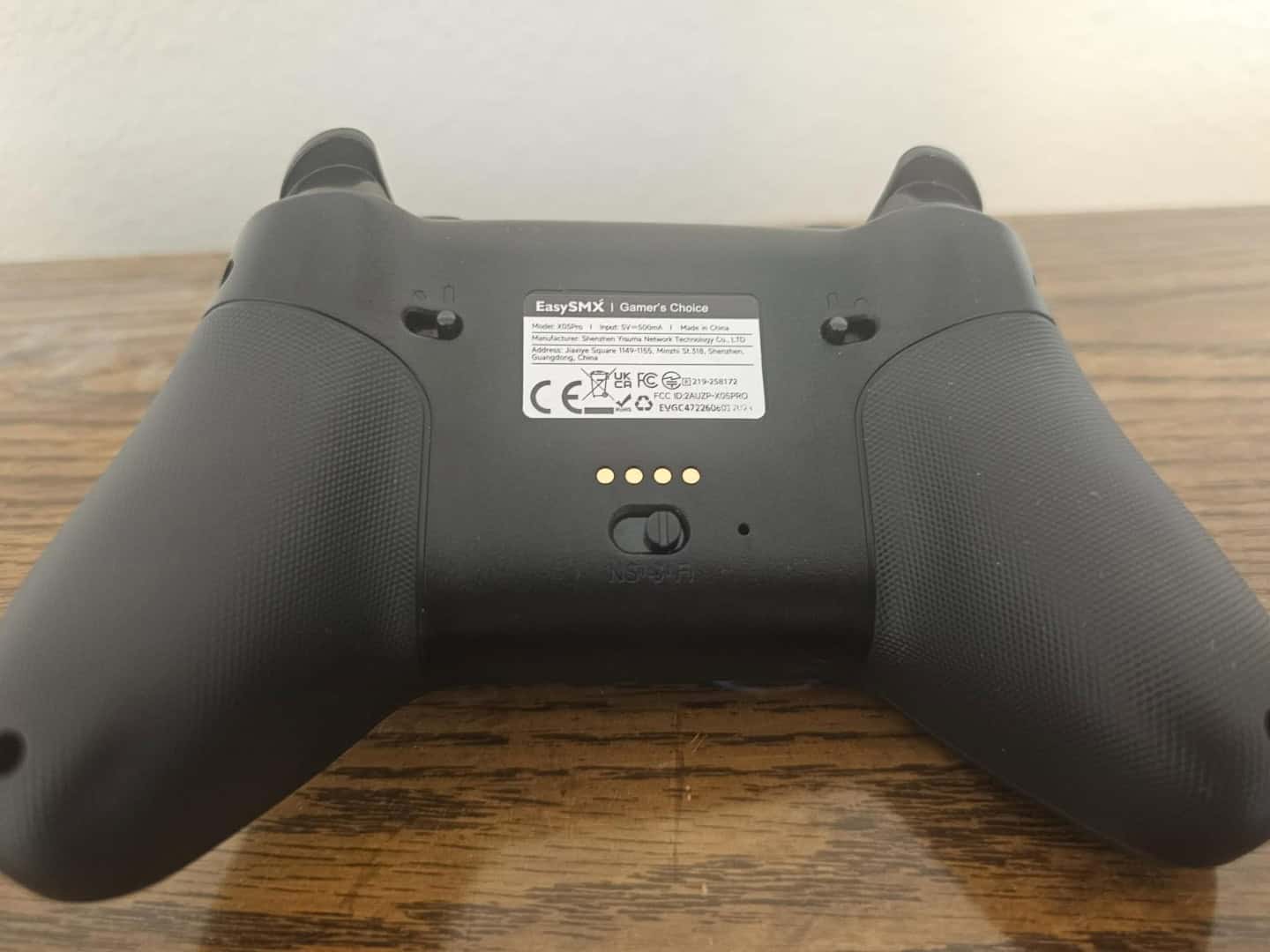 easysmx pro back | The Outerhaven A picture of the back of the EasySMX X05Pro Gaming Controller
