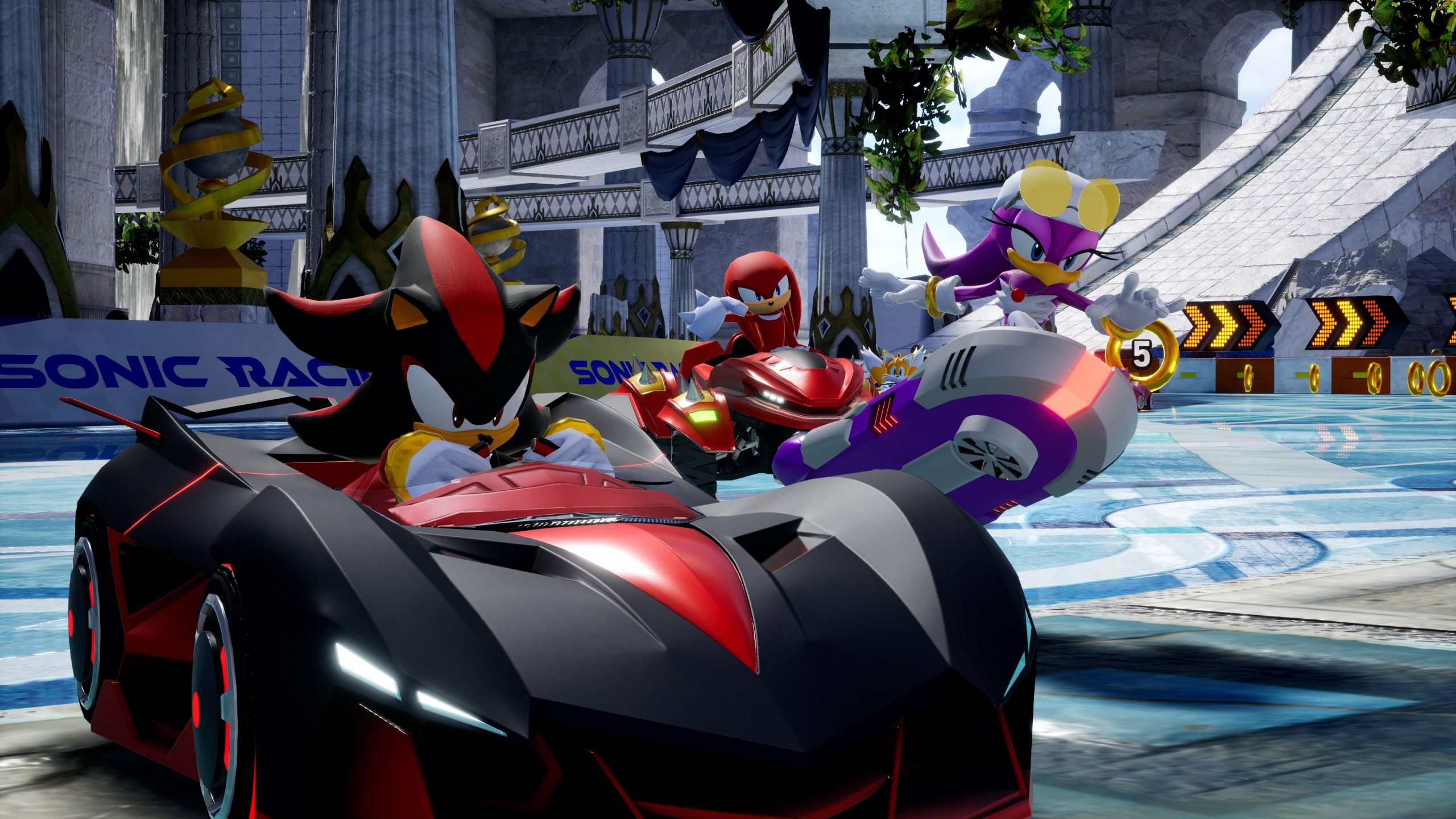 Wave, Shadow, and Knuckles racing in Sonic Racing: CrossWorlds